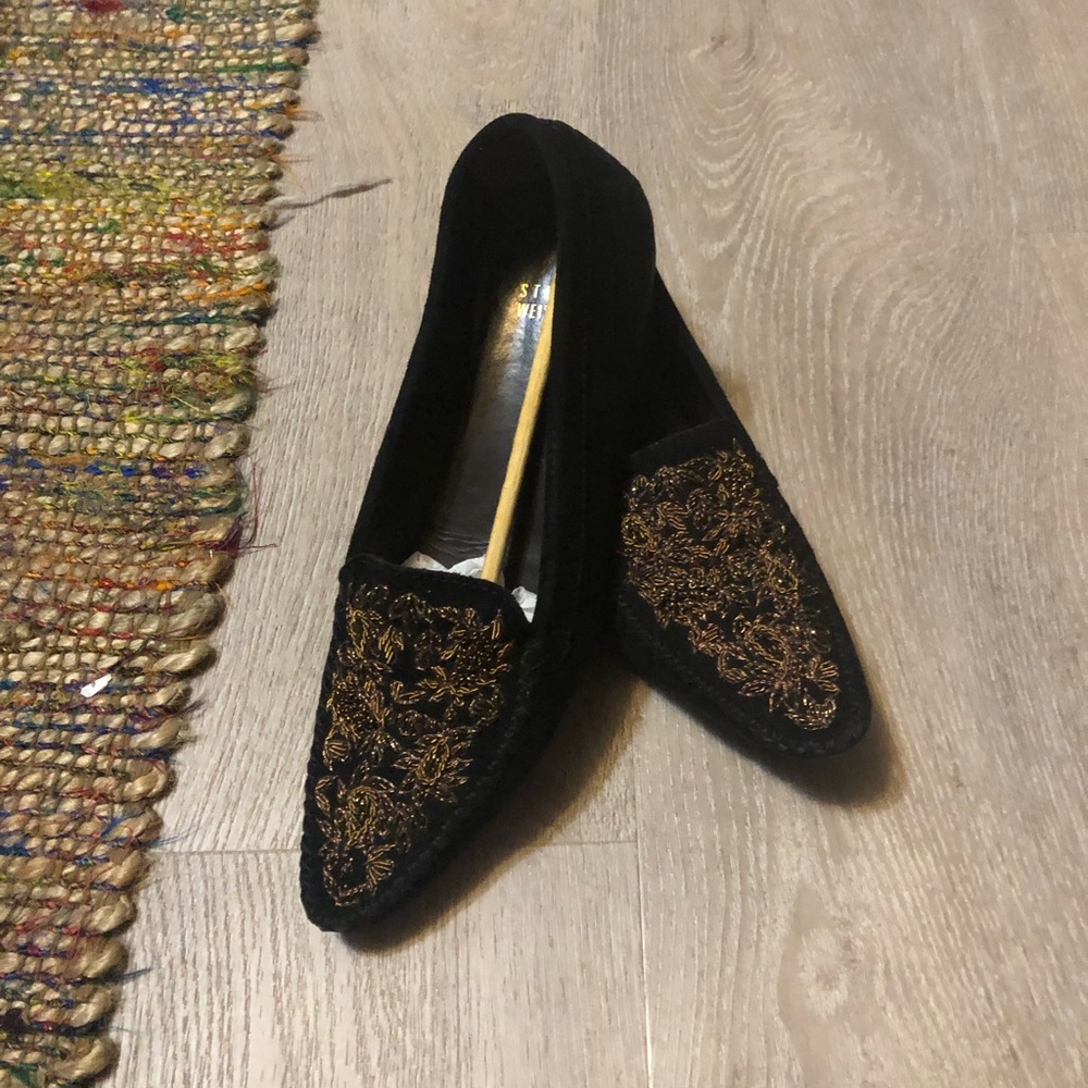 Black and gold loafers